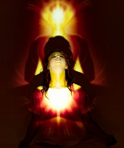 A woman in a serene yoga pose, embodying inner harmony and balance.